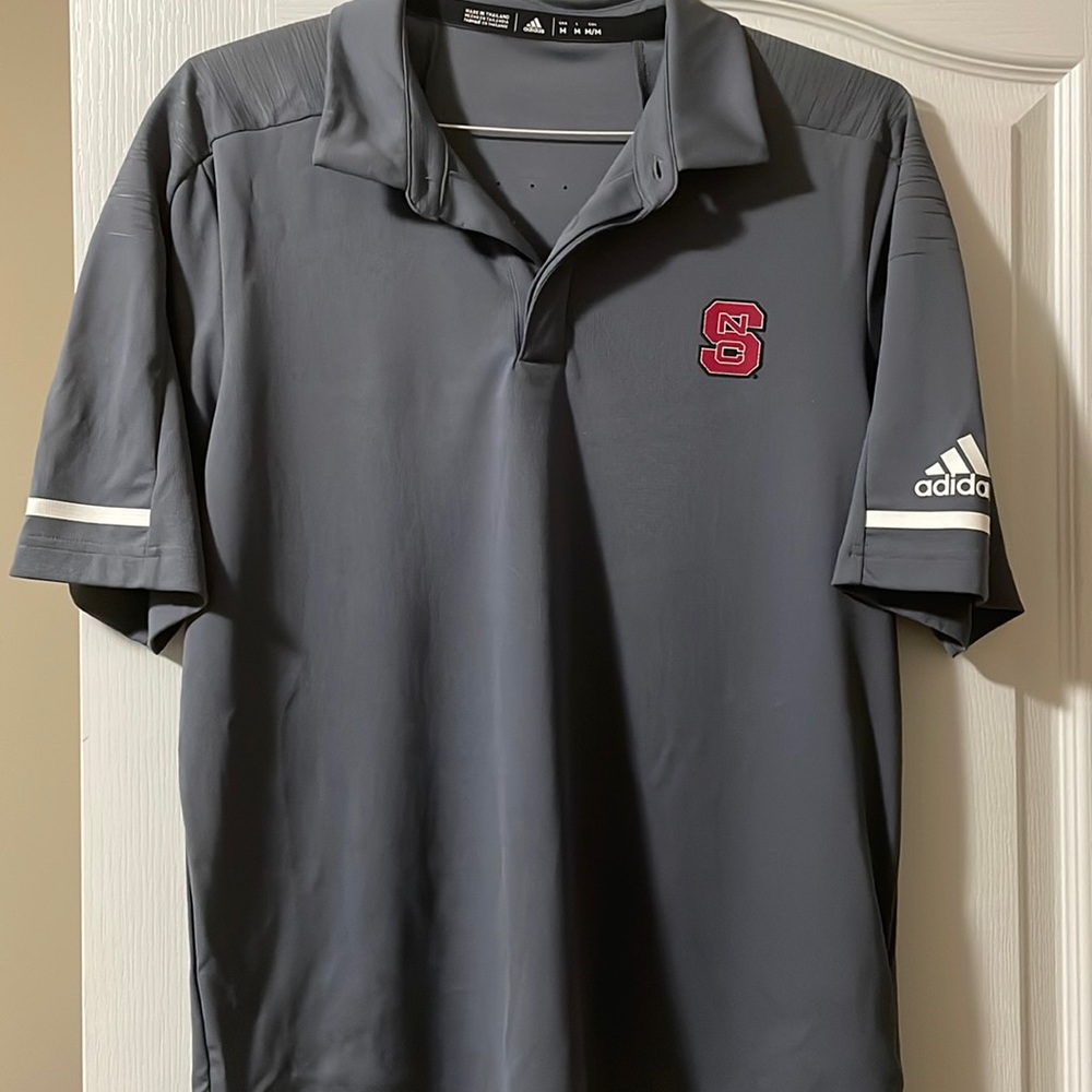 Never been worn NC State polo shirt